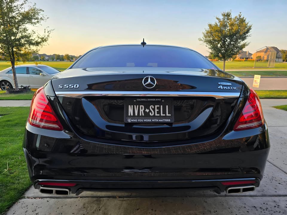 Rick Baker's real Texas license plate, NVR SELL, mounted on his vehicle in a Coldwell Banker Apex plate frame reading Who You Work With Matters